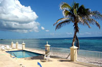 The seaside pool and sundeck off the beachfront condos -- one of two pools and decks at Turtle Nest Inn & Condos, Grand Cayman (TNI Photo)
