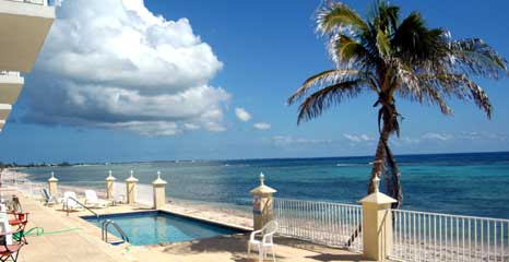 The seaside pool and sundeck off the beachfront condos -- one of two pools and decks at Turtle Nest Inn & Condos, Grand Cayman (TNI Photo)