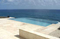 A beautiful seaside "infinity" pool at Sea Spray Cottage, on Grand Cayman.